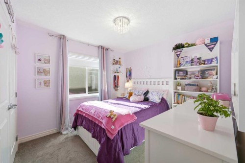 8 Redstone Passage Ne, Calgary, AB - Indoor Photo Showing Bedroom