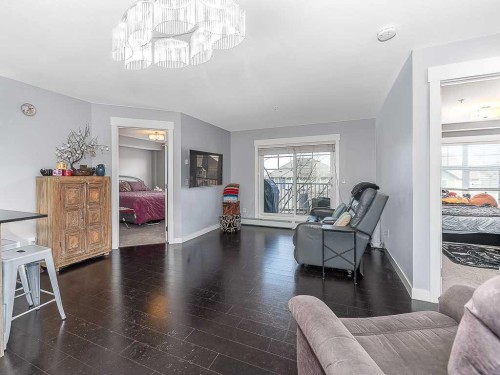 1203-11 Mahogany Row Se, Calgary, AB - Indoor Photo Showing Living Room