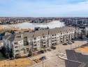 1203-11 Mahogany Row Se, Calgary, AB  - Outdoor With Body Of Water With View 