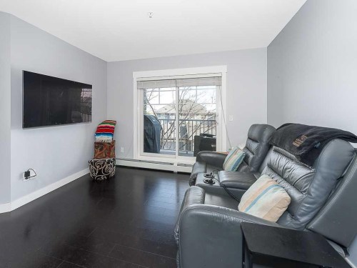 1203-11 Mahogany Row Se, Calgary, AB - Indoor Photo Showing Living Room