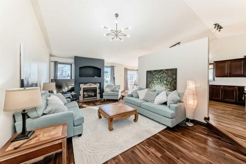 127 Duston Street, Red Deer, AB - Indoor Photo Showing Living Room With Fireplace