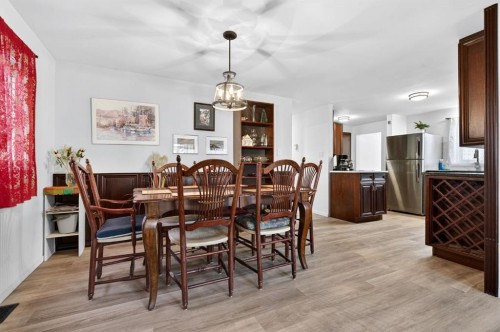 209 Sunset Boulevard Sw, Diamond Valley, AB - Indoor Photo Showing Dining Room