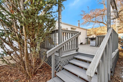 209 Sunset Boulevard Sw, Diamond Valley, AB - Outdoor With Deck Patio Veranda