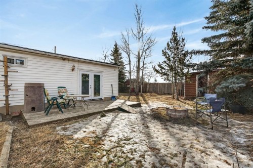 209 Sunset Boulevard Sw, Diamond Valley, AB - Outdoor With Deck Patio Veranda