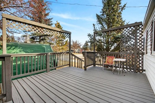 209 Sunset Boulevard Sw, Diamond Valley, AB - Outdoor With Deck Patio Veranda With Exterior