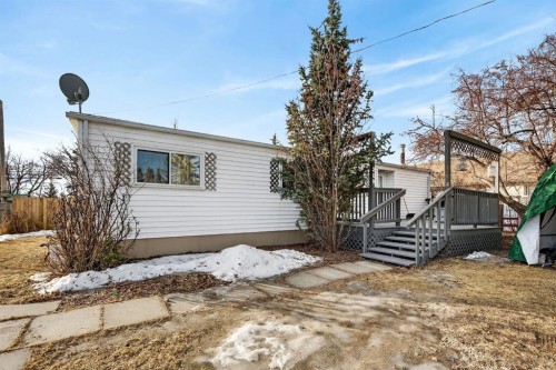 209 Sunset Boulevard Sw, Diamond Valley, AB - Outdoor