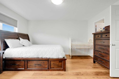 209 Windford Park Sw, Airdrie, AB - Indoor Photo Showing Bedroom