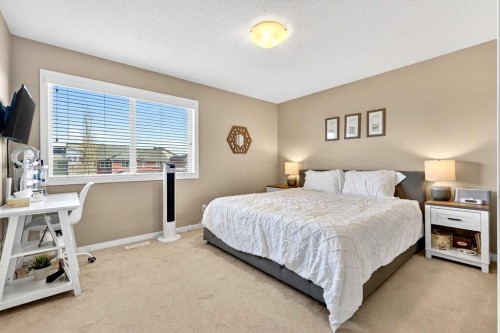 90 Walden Crescent Se, Calgary, AB - Indoor Photo Showing Bedroom