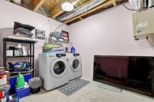 90 Walden Crescent Se, Calgary, AB - Indoor Photo Showing Laundry Room
