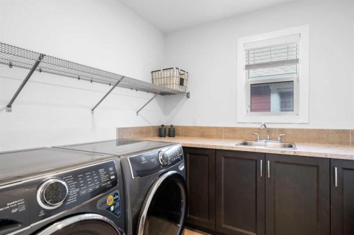 99 Ridge View Close, Cochrane, AB - Indoor Photo Showing Laundry Room