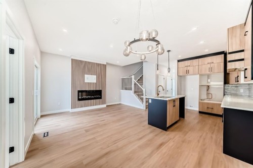 1947 Mccaskill Drive, Crossfield, AB - Indoor With Fireplace