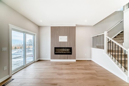 1947 Mccaskill Drive, Crossfield, AB - Indoor With Fireplace