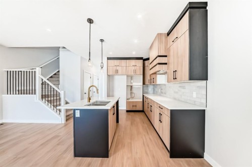 1947 Mccaskill Drive, Crossfield, AB - Indoor Photo Showing Kitchen With Double Sink