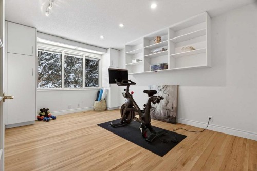 6913 Leaside Drive Sw, Calgary, AB - Indoor Photo Showing Gym Room
