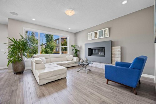 144 Legacy Mount Se, Calgary, AB - Indoor Photo Showing Living Room With Fireplace