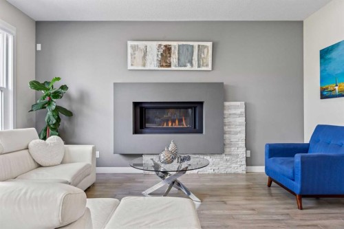 144 Legacy Mount Se, Calgary, AB - Indoor Photo Showing Living Room With Fireplace