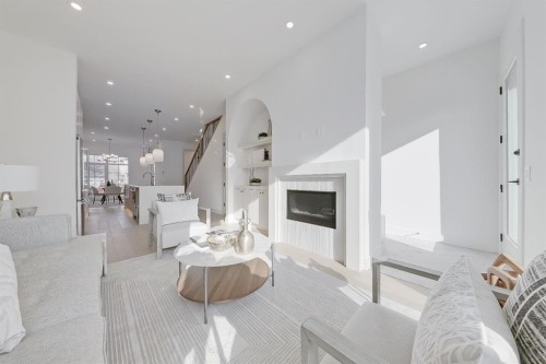 417 22 Avenue Nw, Calgary, AB - Indoor Photo Showing Living Room With Fireplace