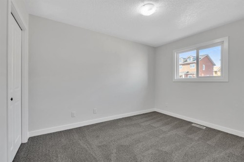 235 Kinniburgh Road, Chestermere, AB - Indoor Photo Showing Other Room