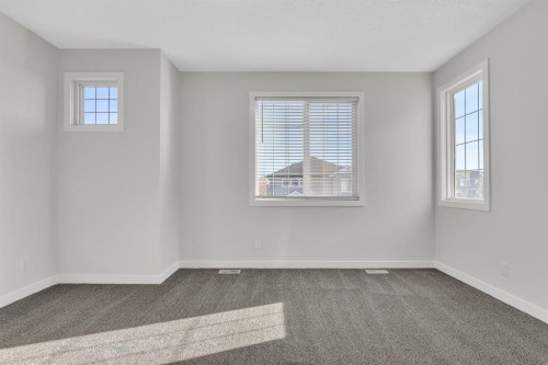 235 Kinniburgh Road, Chestermere, AB - Indoor Photo Showing Other Room