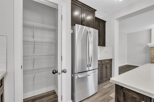 235 Kinniburgh Road, Chestermere, AB - Indoor Photo Showing Kitchen