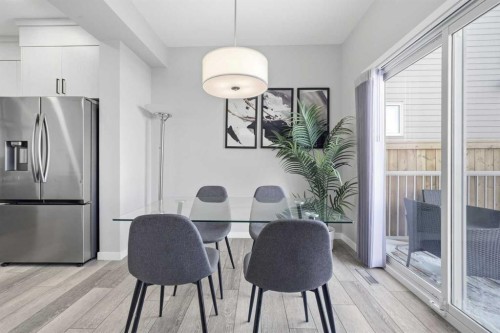 704 Creekstone Circle Sw, Calgary, AB - Indoor Photo Showing Dining Room