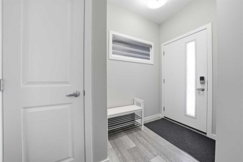 704 Creekstone Circle Sw, Calgary, AB - Indoor Photo Showing Other Room