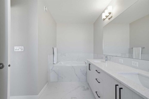 704 Creekstone Circle Sw, Calgary, AB - Indoor Photo Showing Bathroom