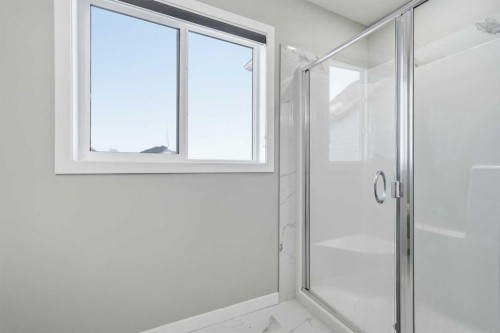 704 Creekstone Circle Sw, Calgary, AB - Indoor Photo Showing Bathroom