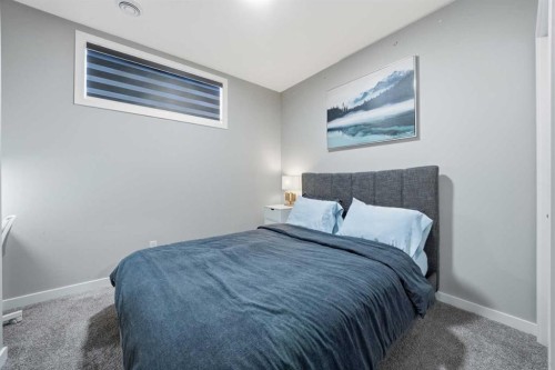 704 Creekstone Circle Sw, Calgary, AB - Indoor Photo Showing Bedroom