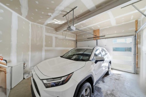 704 Creekstone Circle Sw, Calgary, AB - Indoor Photo Showing Garage