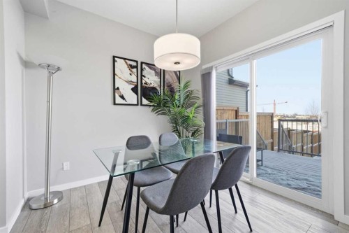 704 Creekstone Circle Sw, Calgary, AB - Indoor Photo Showing Dining Room