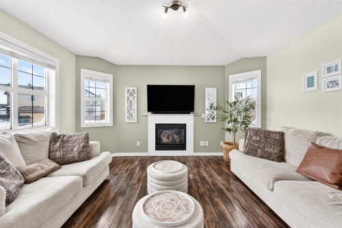 108 Cimarron Grove Circle, Okotoks, AB - Indoor Photo Showing Living Room With Fireplace