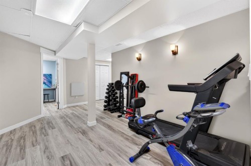 108 Cimarron Grove Circle, Okotoks, AB - Indoor Photo Showing Gym Room