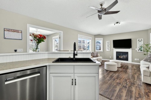 108 Cimarron Grove Circle, Okotoks, AB - Indoor With Fireplace