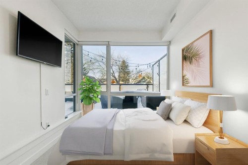 210-301 10 Street Nw, Calgary, AB - Indoor Photo Showing Bedroom