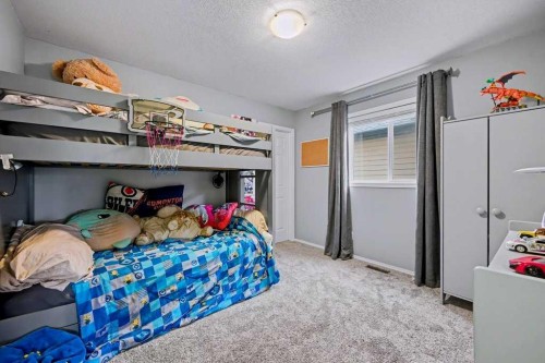 19 Copperfield Crescent Se, Calgary, AB - Indoor Photo Showing Bedroom