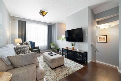 1815 Copperfield Boulevard Se, Calgary, AB - Indoor Photo Showing Living Room