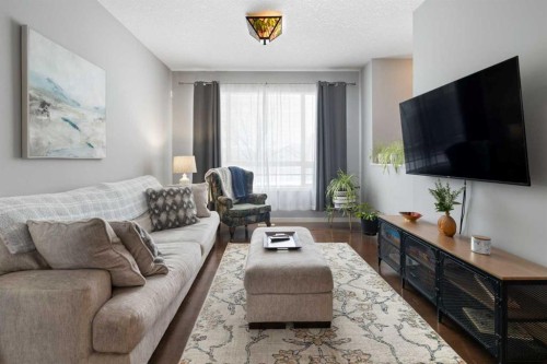 1815 Copperfield Boulevard Se, Calgary, AB - Indoor Photo Showing Living Room