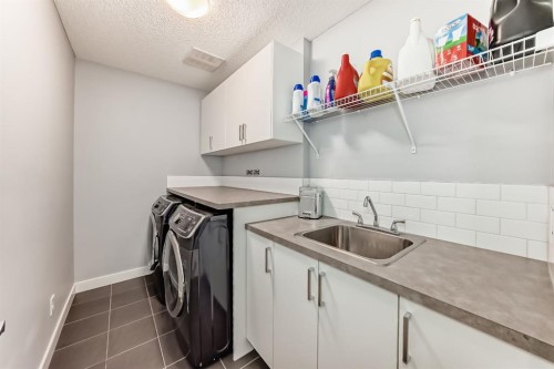 58 Sage Bluff View Nw, Calgary, AB - Indoor Photo Showing Laundry Room