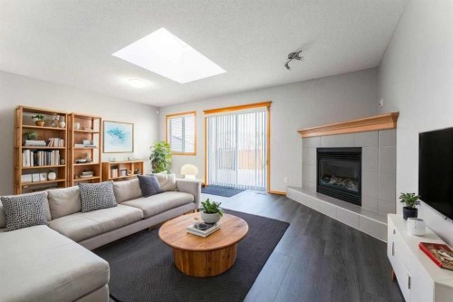 14 Taralea Bay Ne, Calgary, AB - Indoor Photo Showing Living Room With Fireplace