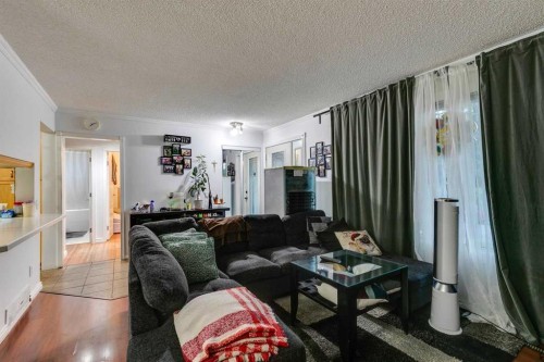 100 Allandale Close Se, Calgary, AB - Indoor Photo Showing Living Room