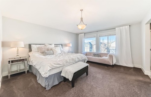 28 Ranchers Manor, Okotoks, AB - Indoor Photo Showing Bedroom