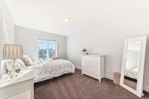 28 Ranchers Manor, Okotoks, AB - Indoor Photo Showing Bedroom