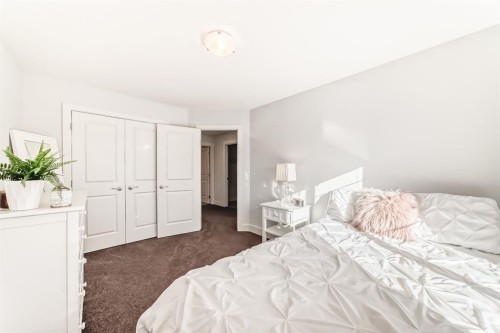 28 Ranchers Manor, Okotoks, AB - Indoor Photo Showing Bedroom