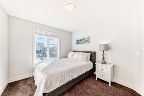 28 Ranchers Manor, Okotoks, AB - Indoor Photo Showing Bedroom