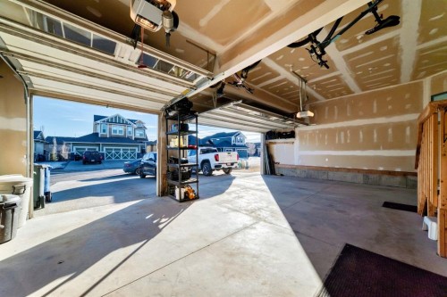 28 Ranchers Manor, Okotoks, AB - Indoor Photo Showing Garage