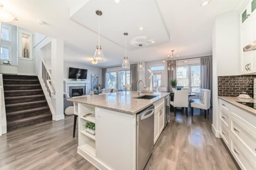 28 Ranchers Manor, Okotoks, AB - Indoor Photo Showing Kitchen With Upgraded Kitchen
