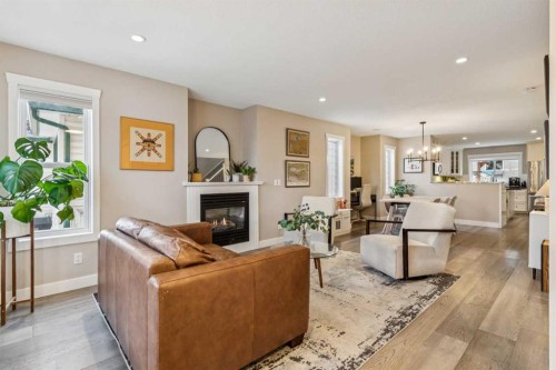 133 25 Avenue Ne, Calgary, AB - Indoor Photo Showing Living Room With Fireplace