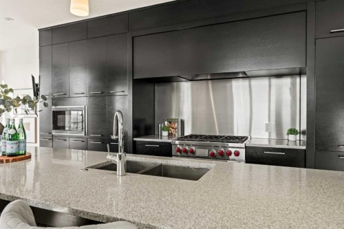 101 Aspen Meadows Hill Sw, Calgary, AB - Indoor Photo Showing Kitchen With Double Sink With Upgraded Kitchen