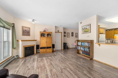 1206-151 Country Village Road Ne, Calgary, AB - Indoor Photo Showing Living Room With Fireplace